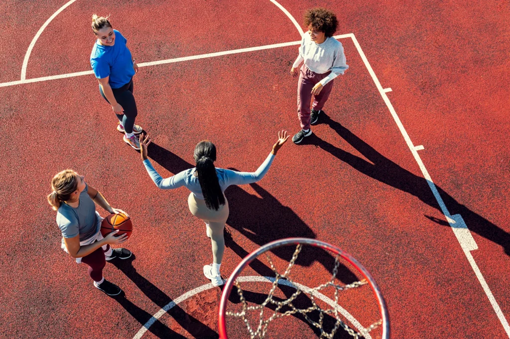 diverse group of young woman having fun playing