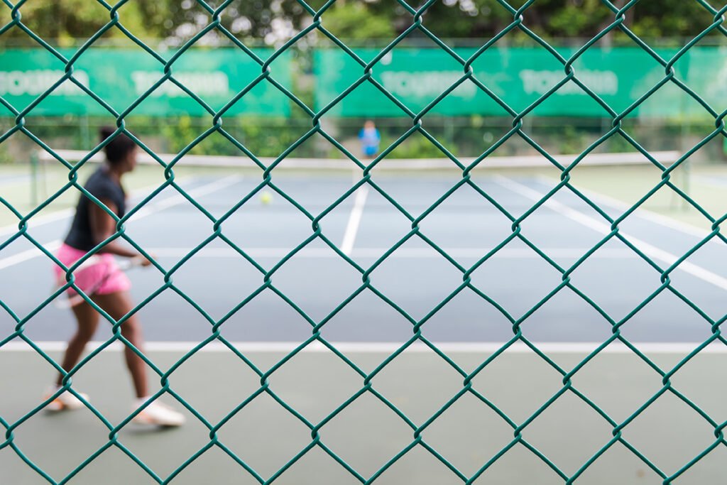 defocus and blur photo of tennis court with tennis