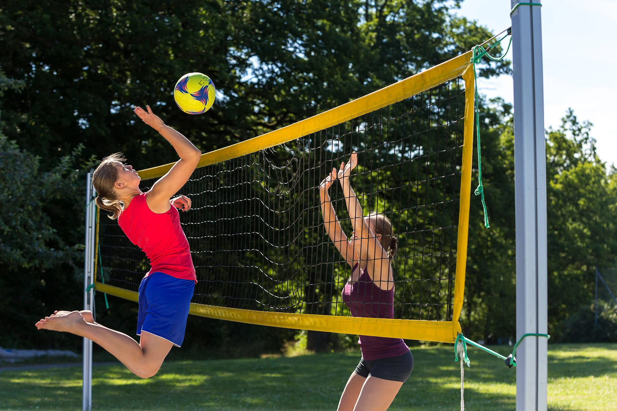 germany young women playing beach volleyball