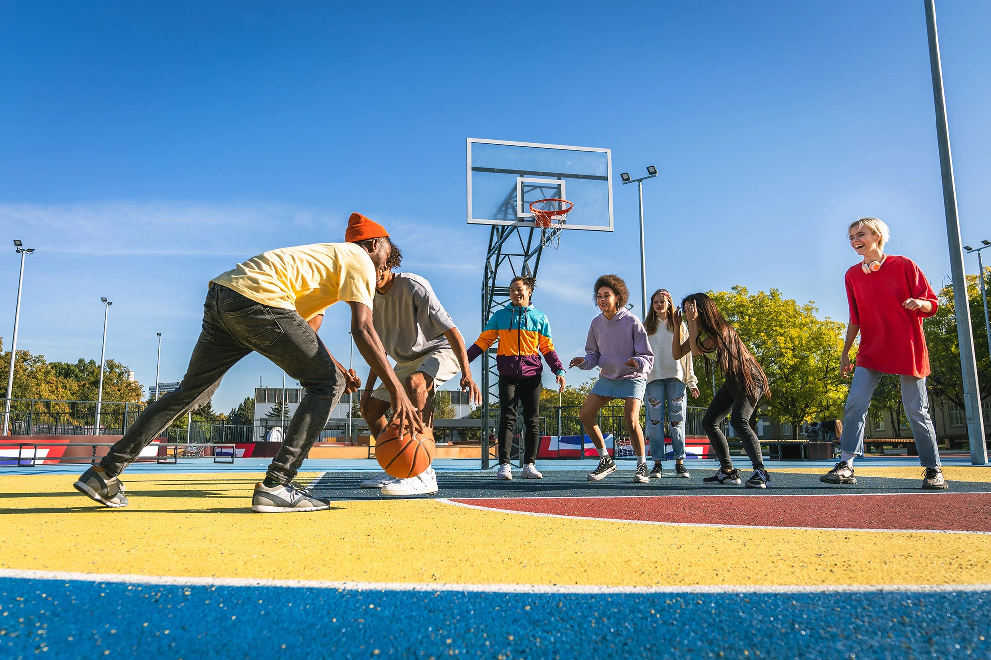 multiracial group of young friends bonding outdoor