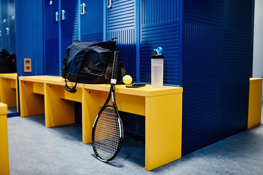 sports equipment in locker room