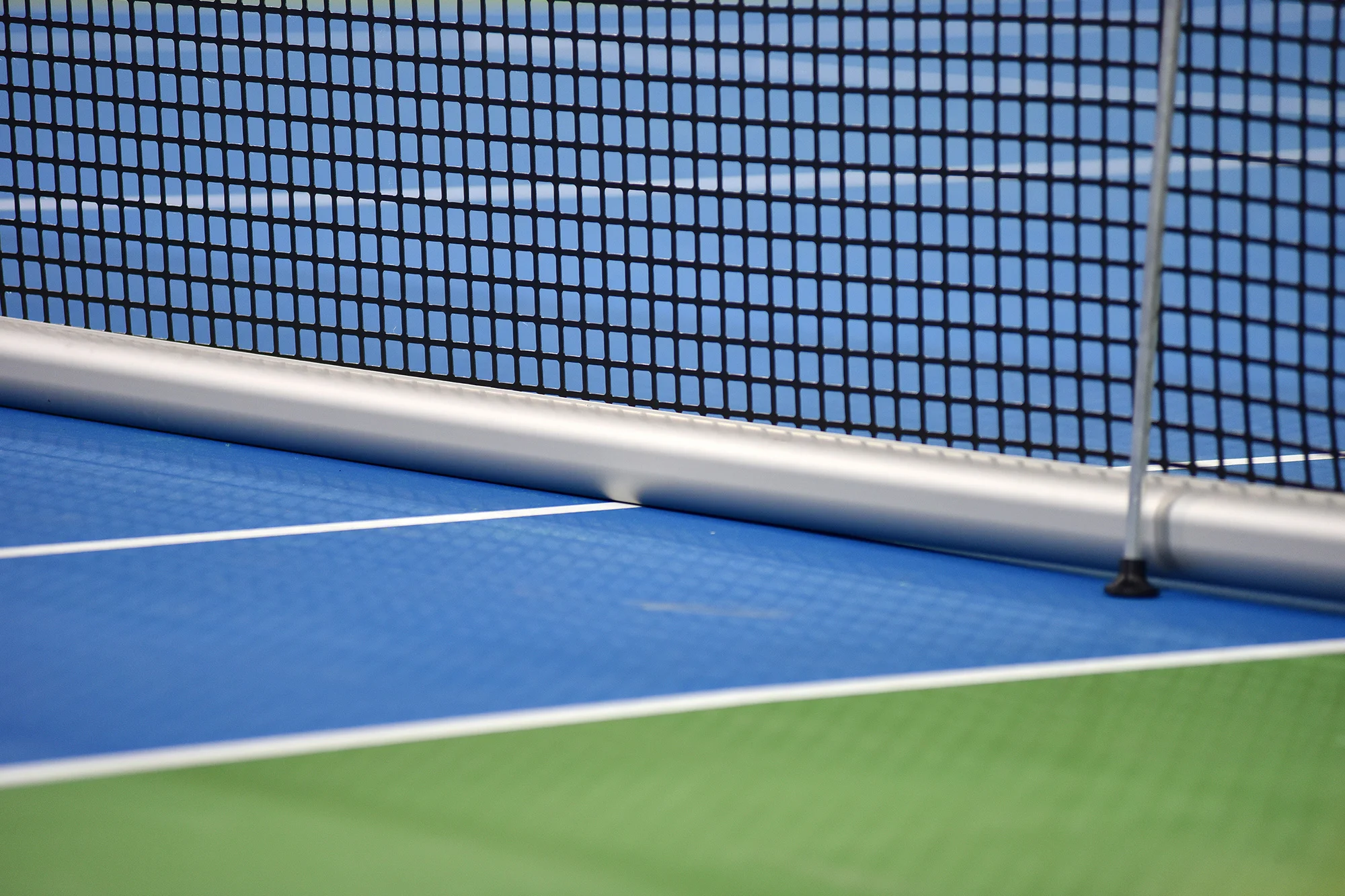 tennis blue hard court with net